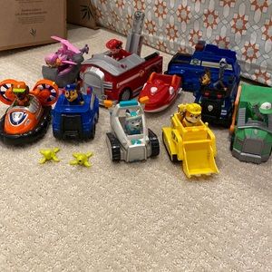 Lot of Paw Patrol figurines and vehicles